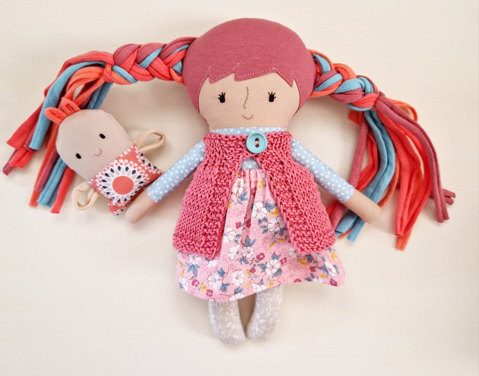 Fabric doll bed with mattress, pillow, blanket and doll clothes