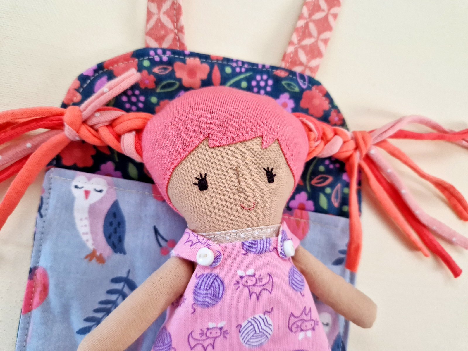 Small play set with a fabric bag and soft doll