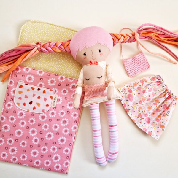 Dress up doll with baby in sleeping bag