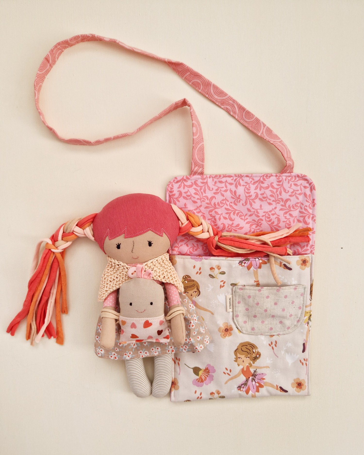 Handmade doll set with a knitted outfit and play accessories