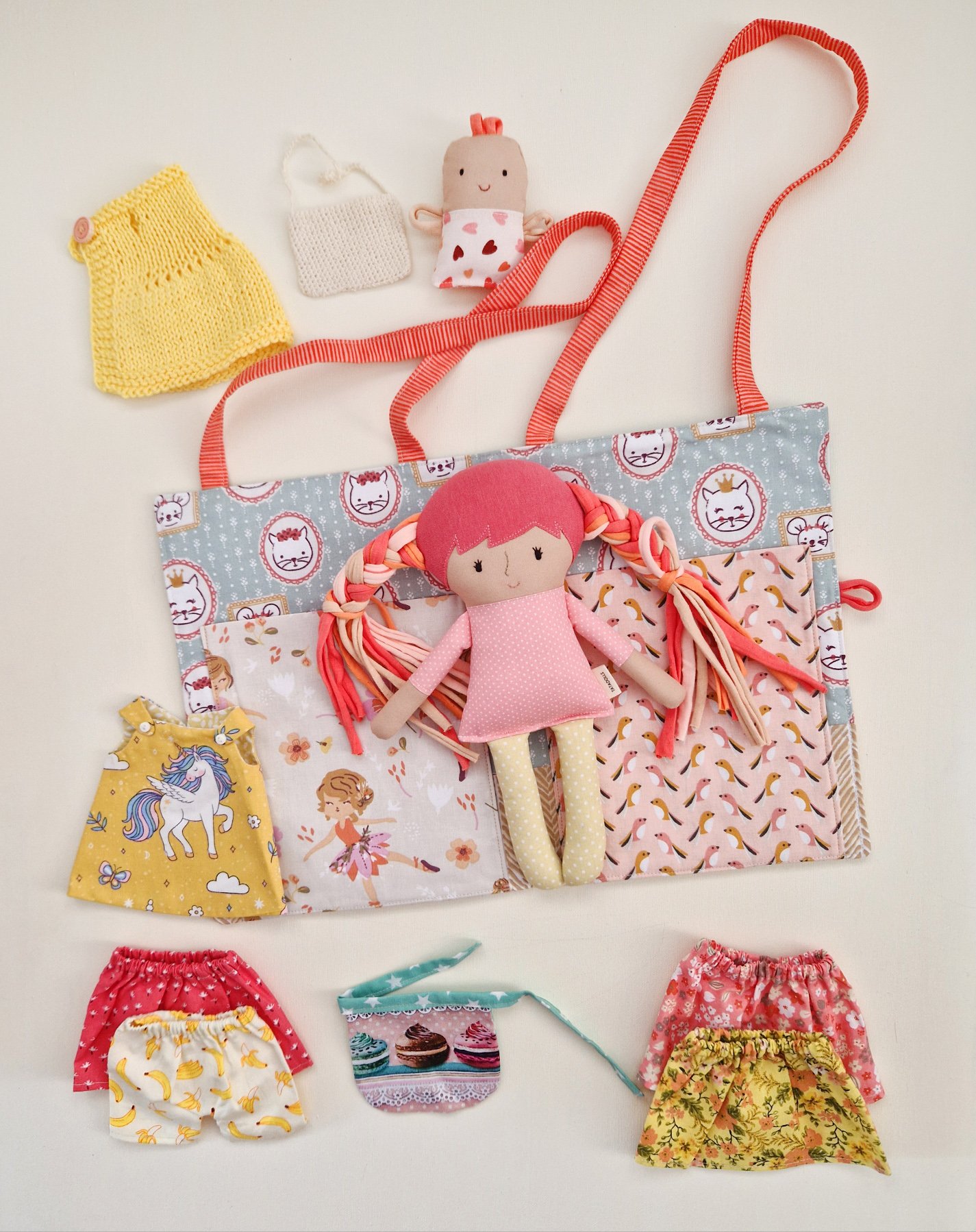 Developmental doll with a house that also works as a carrying bag