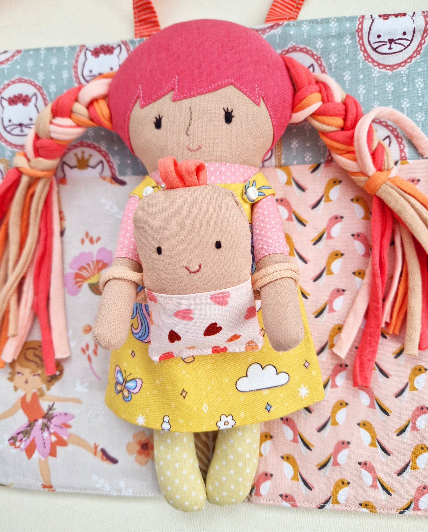 Children's activity doll with a house-shaped carry bag