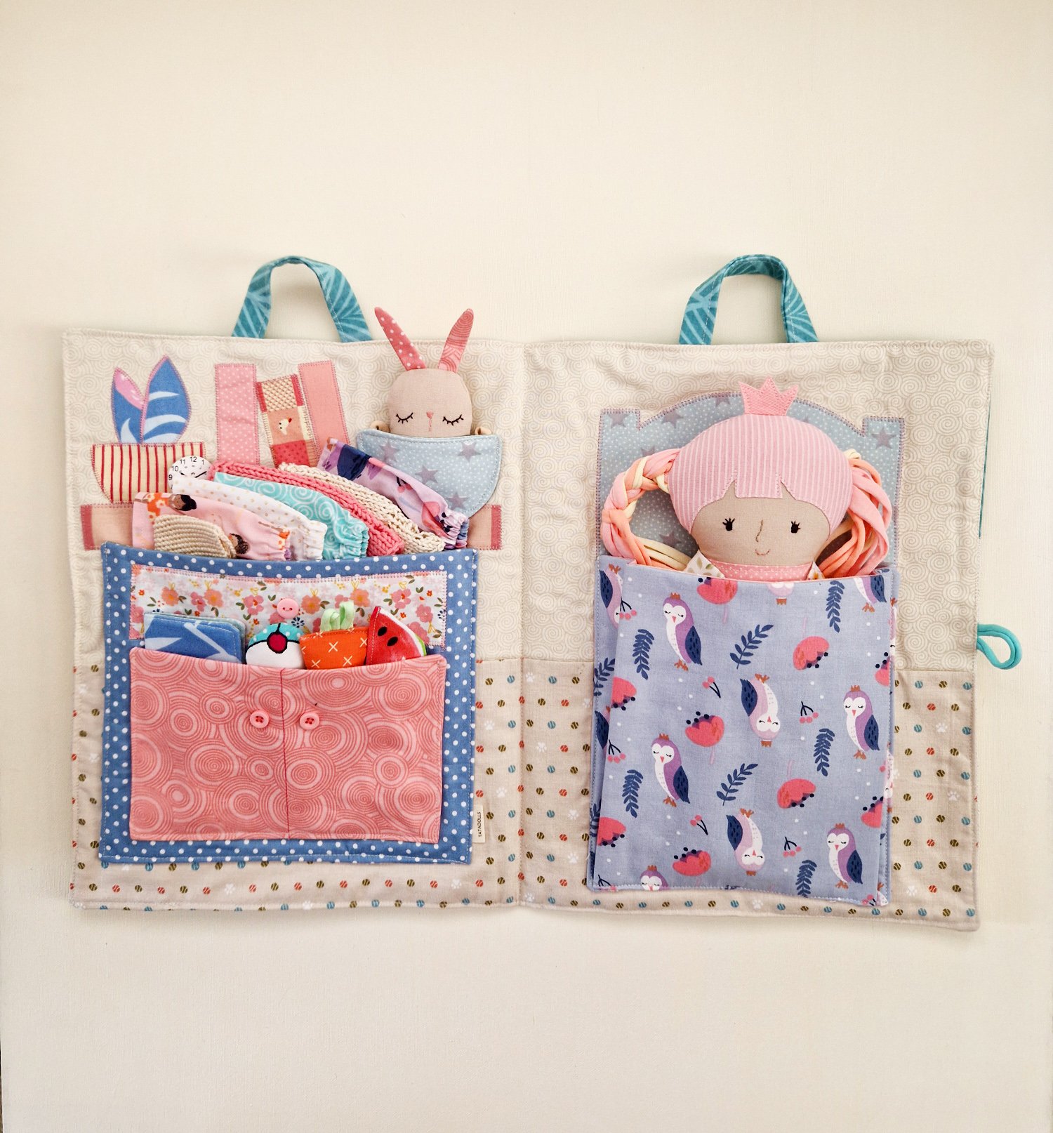 Portable play castle that transforms into a bag with a princess and clothes