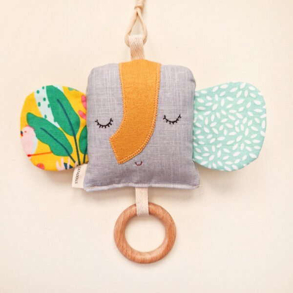 Double-sided fabric elephant rattle with colorful ears and wooden teething ring