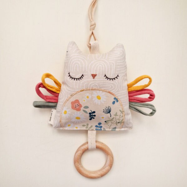 Double-sided baby owl toy with colorful ribbons and wooden teething ring