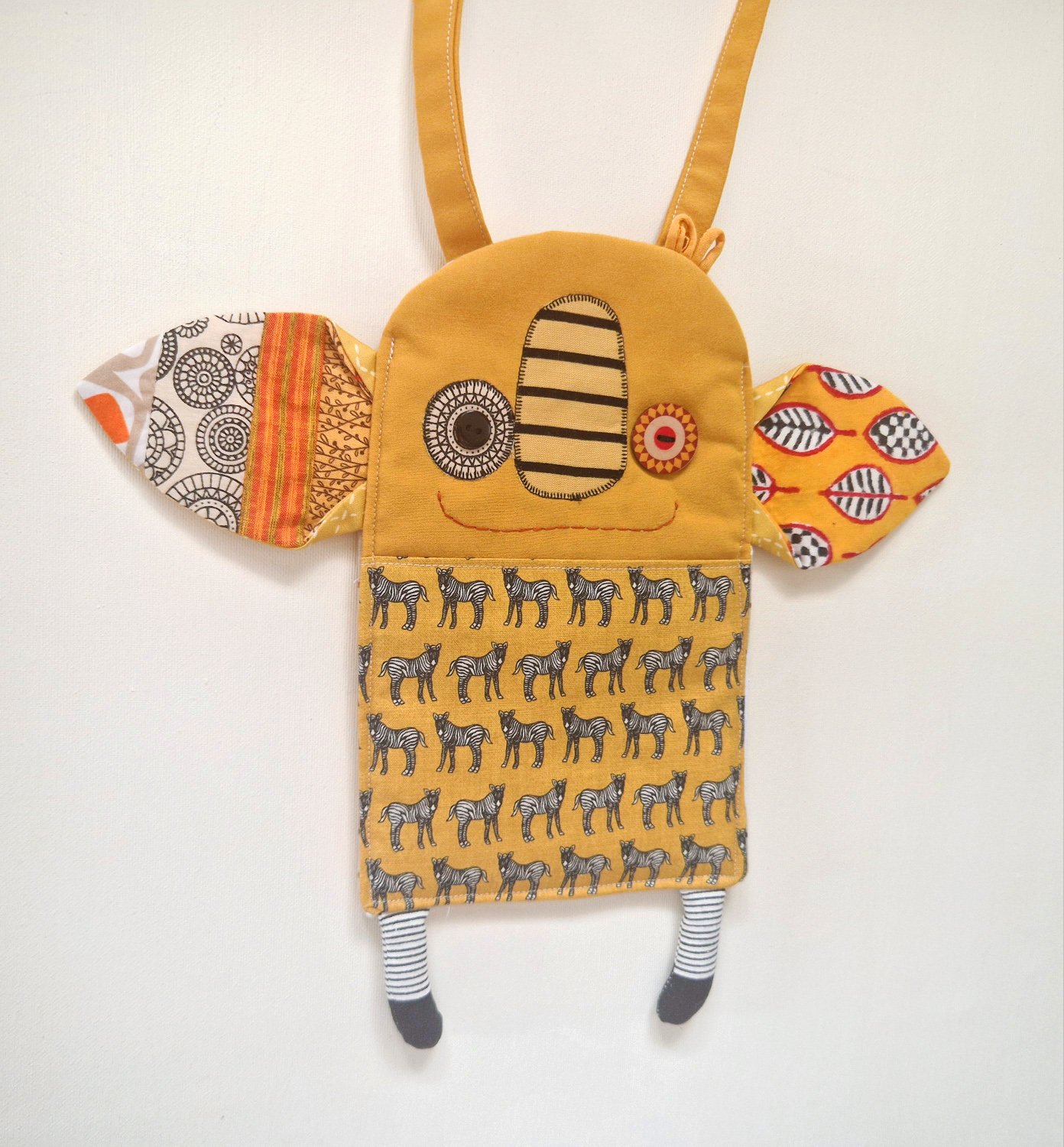 Unique adult crossbody bag shaped like a whimsical character with patterned fabric ears