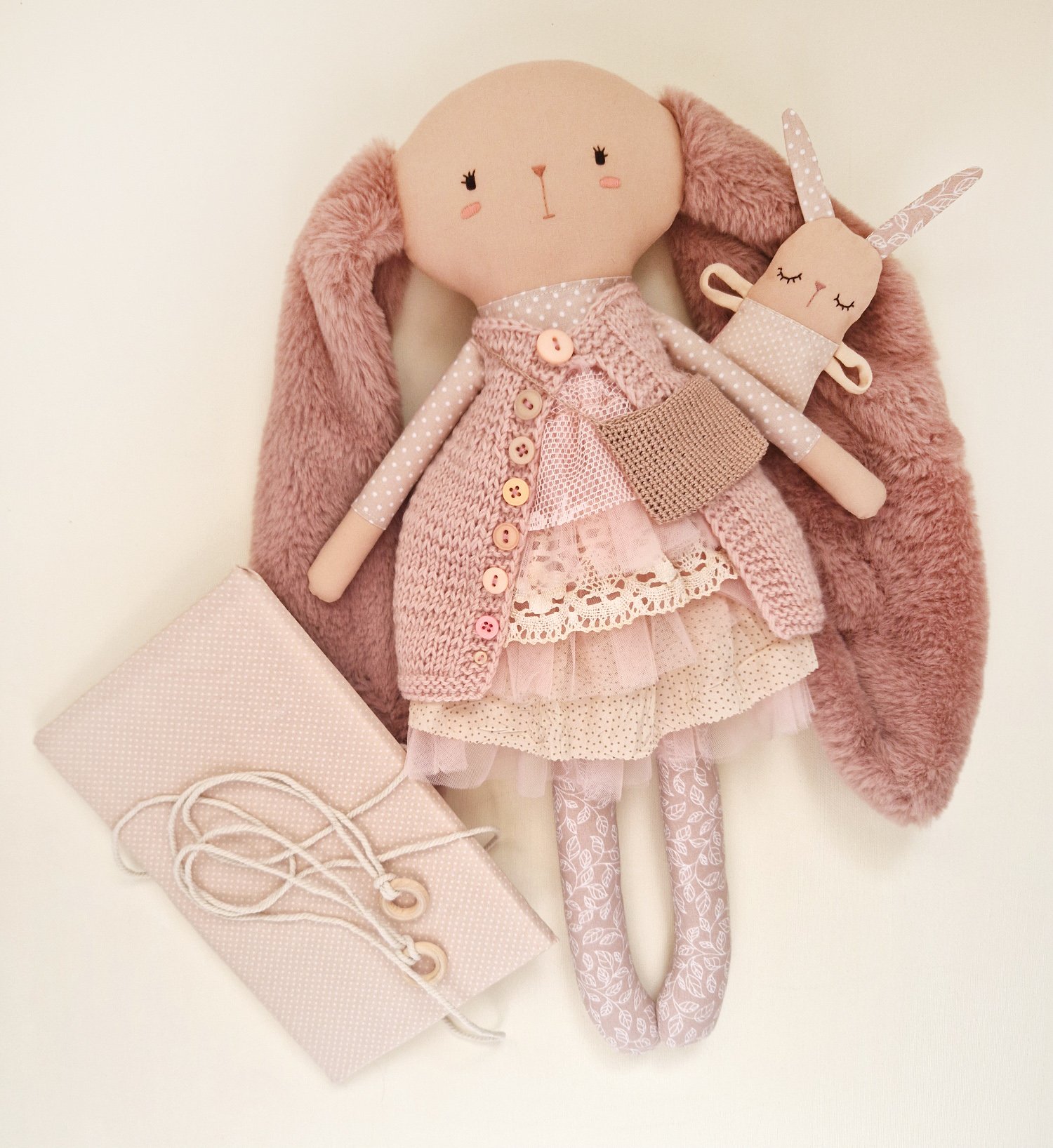 Unique boho nursery decor featuring a mother bunny doll and her baby