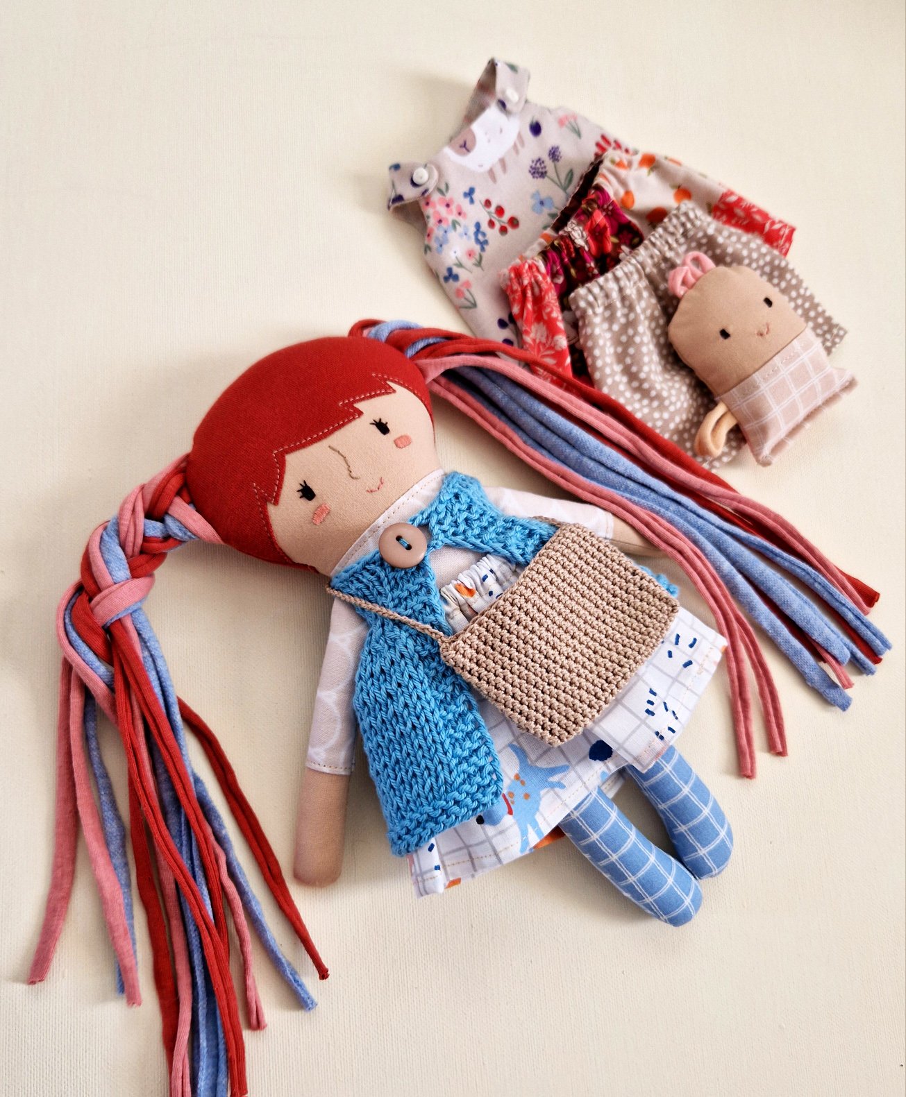 Handcrafted fabric doll for girls with miniature pocket toy and bag
