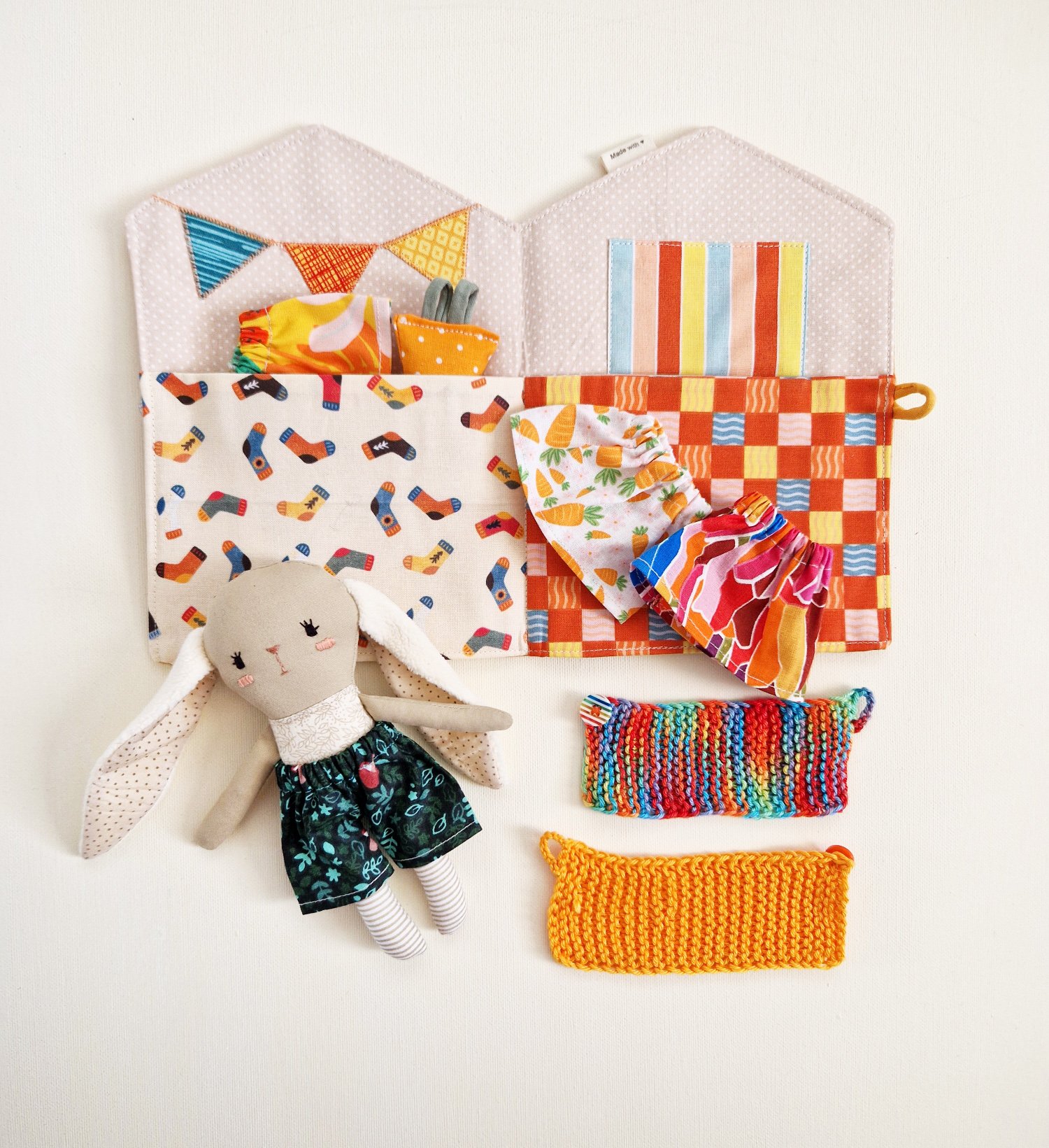 Soft fabric pocket dollhouse with handmade rabbit and knit accessories