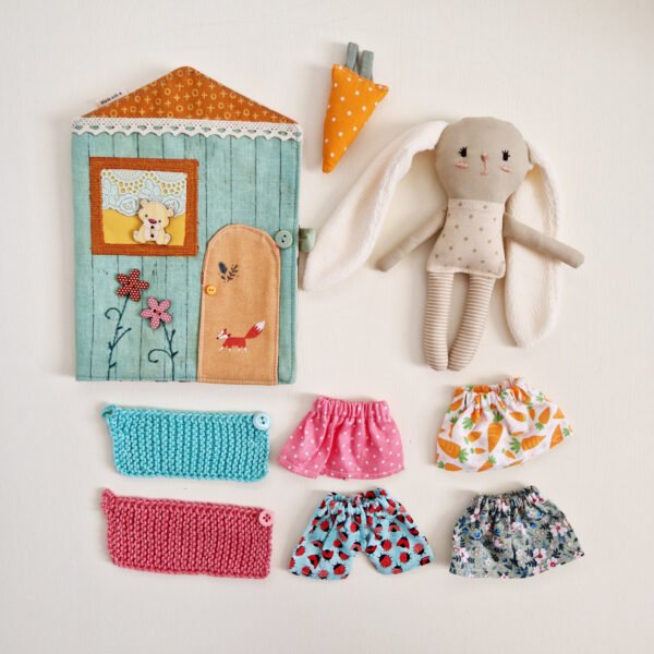 Handmade textile bunny pocket house play set with a removable wardrobe