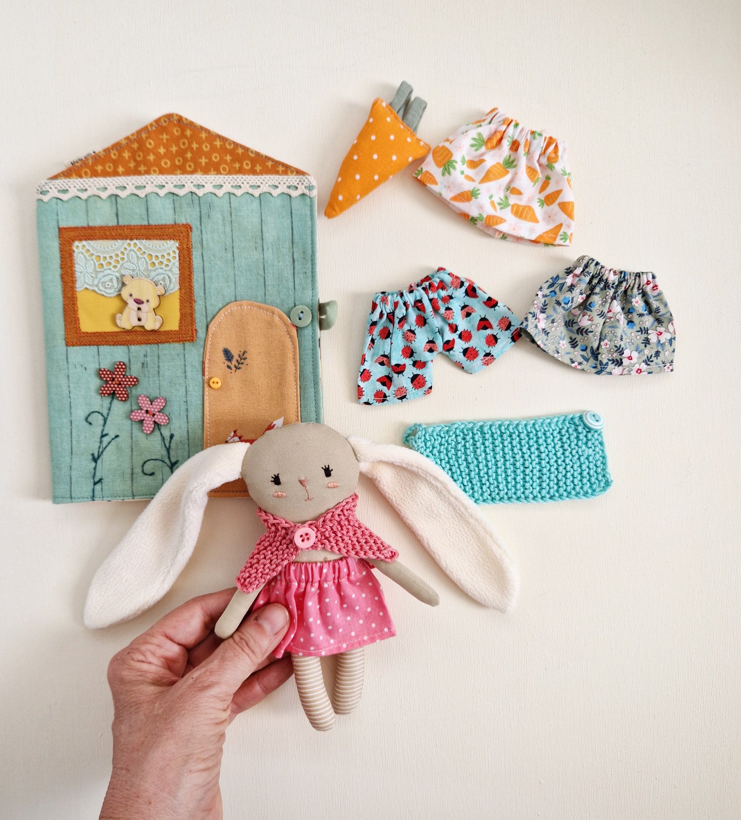sensory toy includes a soft fabric bunny doll